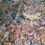 AAVUNO multicolor floral silk embroidered king size bed cover.